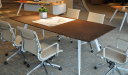 modern office with meeting table and sleek leather chairs