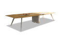 meeting table with light wood top and silver metal legs
