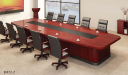 large boardroom with meeting table and leather chairs
