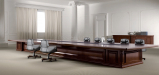 elegant conference room with large conference table in solid wood finish