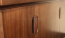 walnut veneer office cabinet with wooden handles