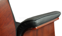 close up view of office chair armrest in black leather