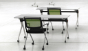 white training tables with green chairs