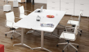 white modular meeting table with white chairs