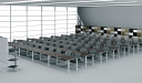 auditorium with modular tables and black chairs