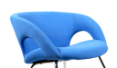 close up view of arm chair in blue fabric
