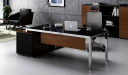 modern office desk with black glass top and steel legs