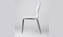 side view of white cafeteria chair with chrome legs