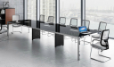 conference room with black glass top table and chairs