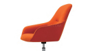 revolving lounge chair in bright orange fabric