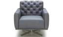 revolving lounge chair in leather with tufted back