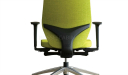 office chair in green fabric and firm lumbar support
