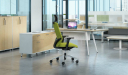 high back office chair in green fabric upholstery and modern office table
