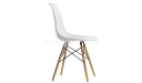 white cafeteria chair with light wood legs