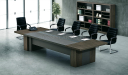 conference room with conference table in dark oak and black chairs