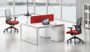 A two seater modular office desk system with two chairs