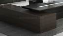 close up view of large office desk in dark oak finish