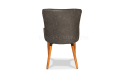 rear view of gray fabric chair with wooden legs