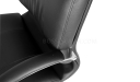 black leather office chair with padded armrests