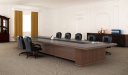 elegant boardroom with large meeting table & chairs